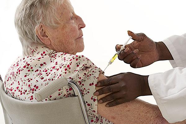 Pnuemonia Image - Elderly woman receiving shot